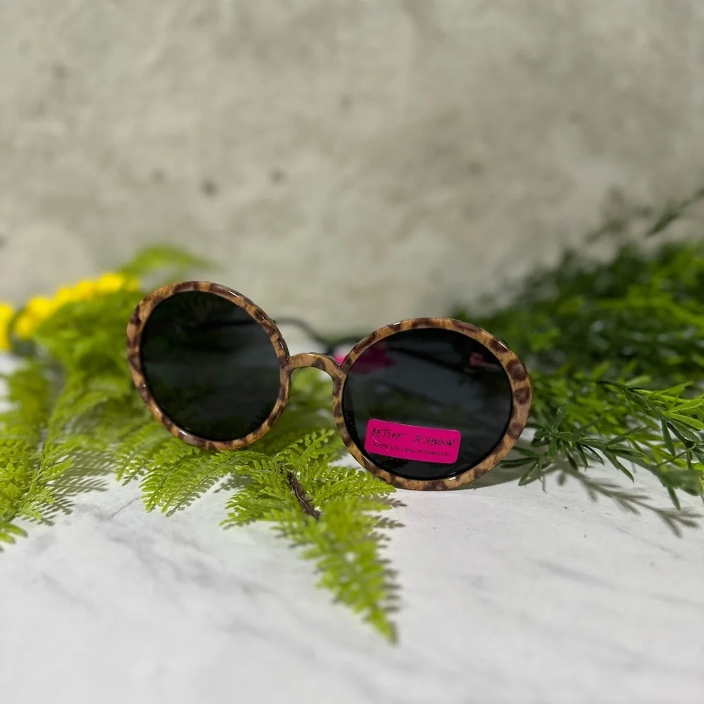 Betsey Johnson animal print circle frame